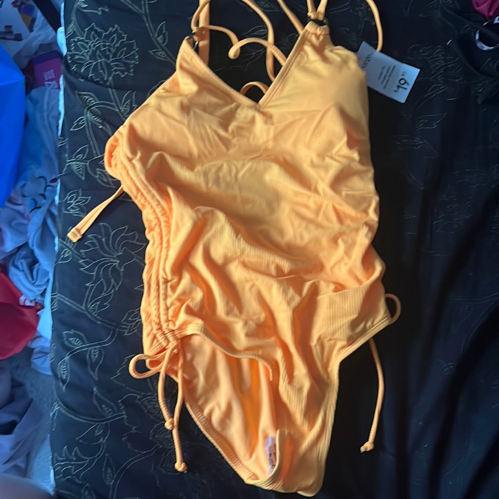 yellow/orange one piece swimsuit